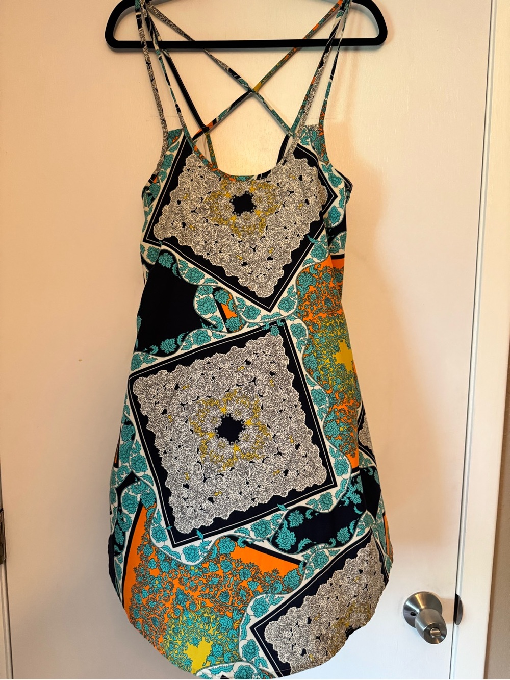 Dina Be Sleeveless Printed Mini Dress in Teal, Orange & Black